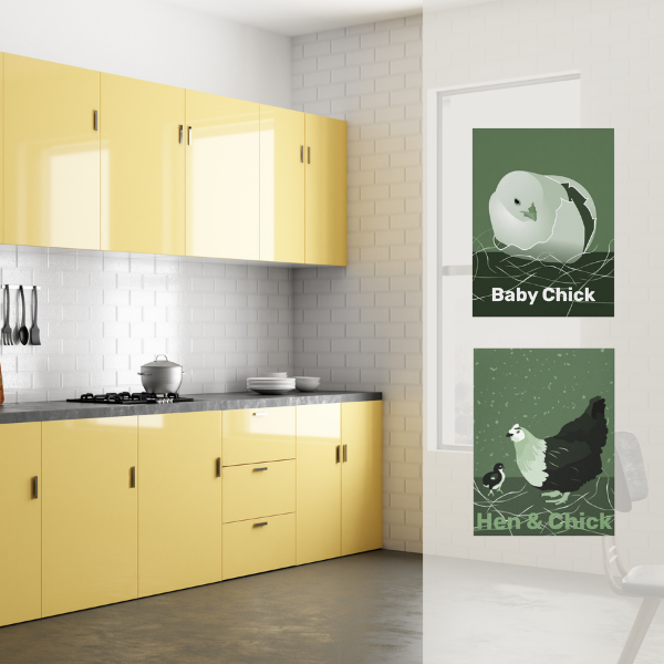 Canvas prints in moss-green show a hen and chick  decorating the wall of a vanilla yellow kitchen