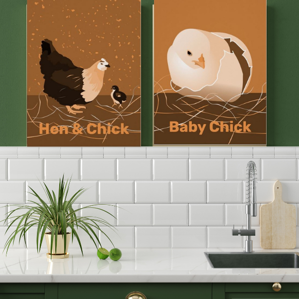 Sandy-orange hen and chick art print decorate a green kitchen wall