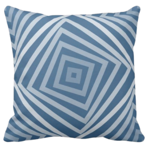 Blue pillow with square spiral pattern