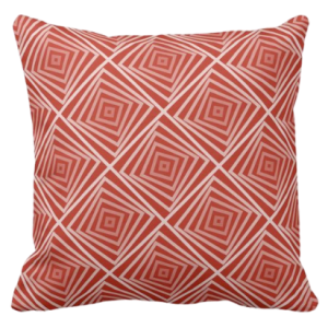Pillow With Orange Square Spiral Pattern