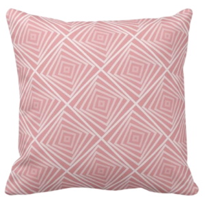 pink pillow with nested square spiral pattern