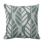 Grey throw pillow with leaves pattern