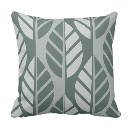 Grey throw pillow with leaves pattern