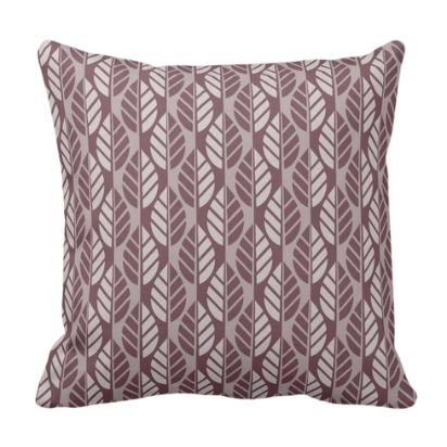 purple throw pillow with leaf pattern