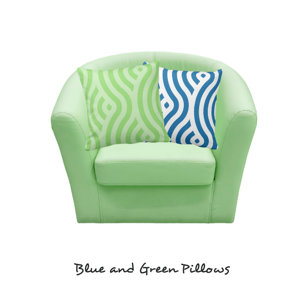 Green and blue pillow on green armchair