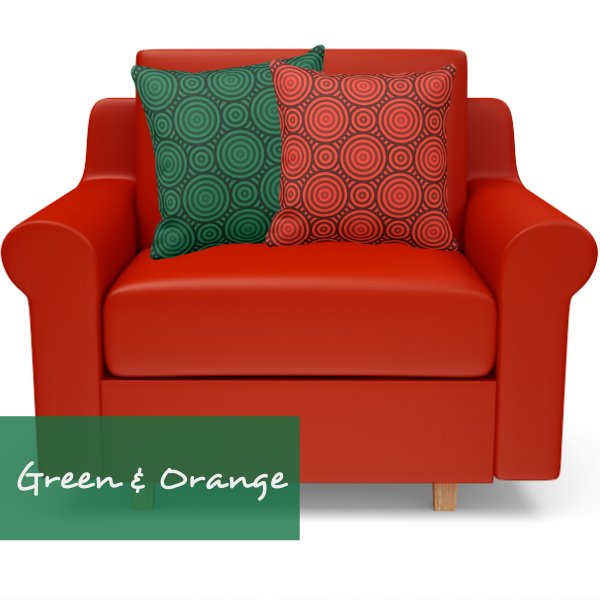 Green and orange thrown pillow on orange armchair
