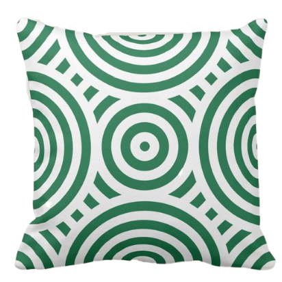 green pillow with a white geometric circle pattern