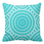in shades of turquoise throw pillow with a nested circular pattern