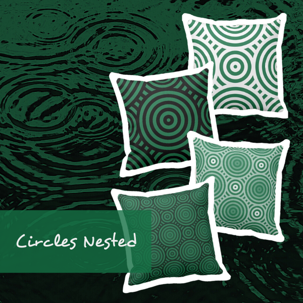 Green throw pillows with nested geometric circles pattern