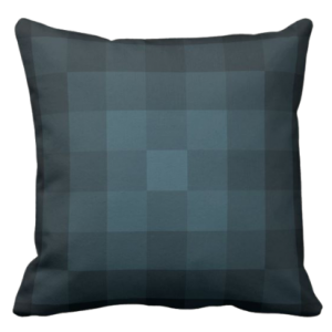 blue pillow with monochrome square pixel pattern