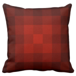 orange pillow with monochrome square pixel pattern