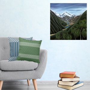 Beyond The Cascade By NewZealand Artist Diane Adams decorating a living-room corner with a grey armchair and two throw pillows in blue and green showing a stripes and checkers pattern