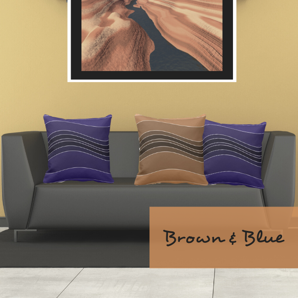 Brown and blue throw pillows with wavy stripes decorate a grey couch in a modern living room