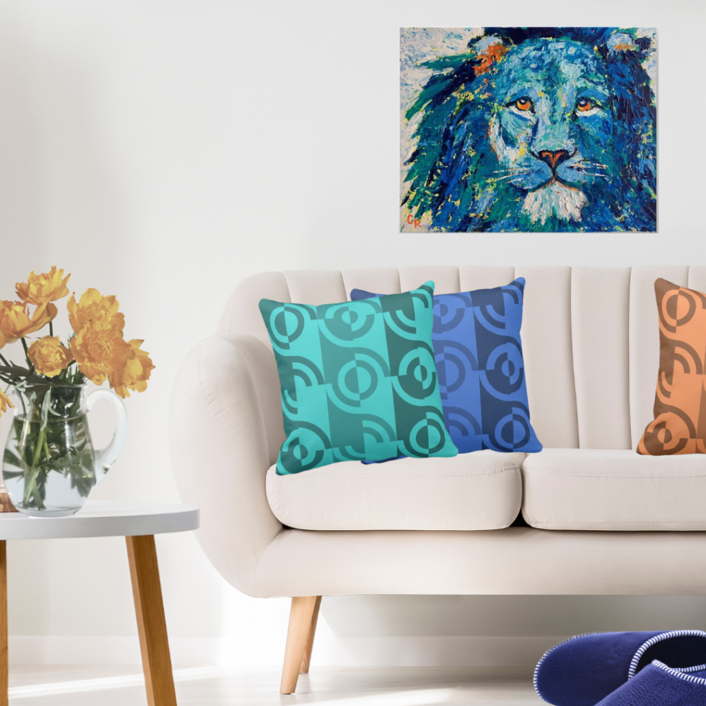 Brave By Chris Rice And Fragmented Circle Patterned Pillows in orange and turquoise