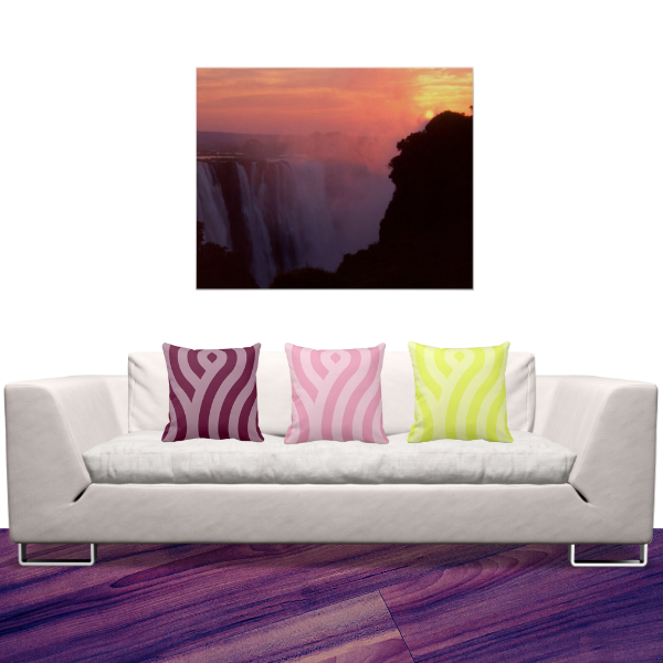 Victoria Falls At Sunset And Yellow, Pink, And Purple Pillows With Wave Pattern