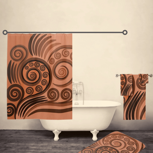 Artsy orange-brown fern frond bathroom decor idea, consisting of a shower curtain, bath mat, and towel set.