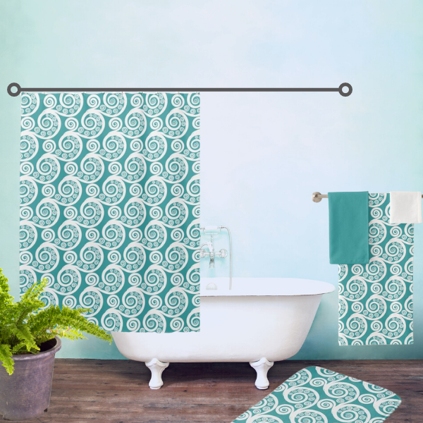 Trendy turquoise and white swirls bathroom decor idea, consisting of a shower curtain, bath mat, and towel set.