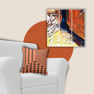 orange pillow with diamond pattern and custom print showing a beach cave