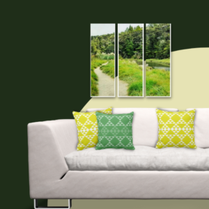 three paneled bush track photo print to make a triptych with yellow & green triangle patterned pillows