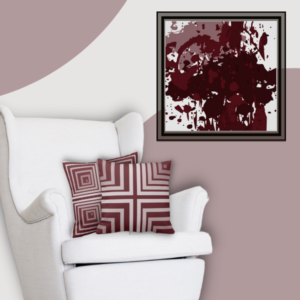 Red splatterart complements red throw pillows with nested box and angular pattern