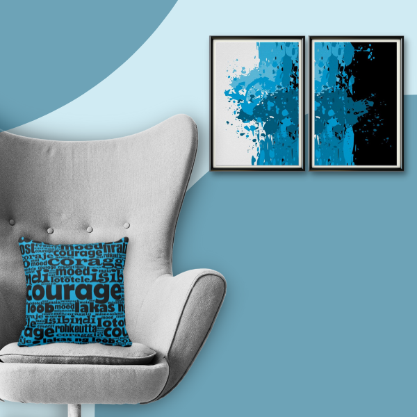 Paint splatter blue wall art meets black and blue throw pillow with typography pattern courage