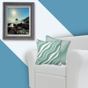 wavy line patterned green and white pillow with a photo wall decor of a rugged NZ coast