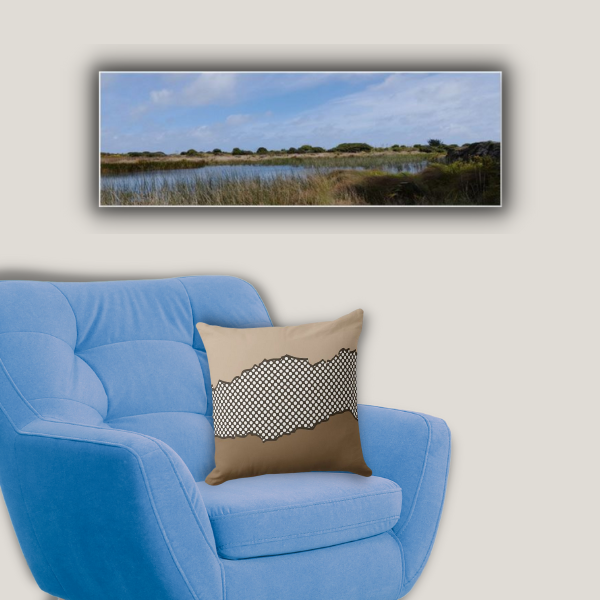 Swamp Landscape Photo Print and a brown and white pillow in the torn pattern