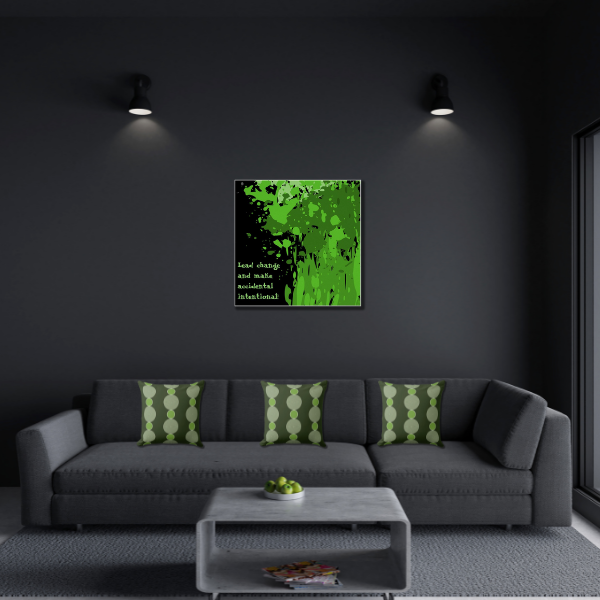 Anthracite color palette accented with green wall art and green throw pillows