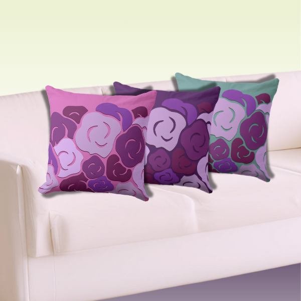 Three Pillows with a Stylized Blossoms Pattern